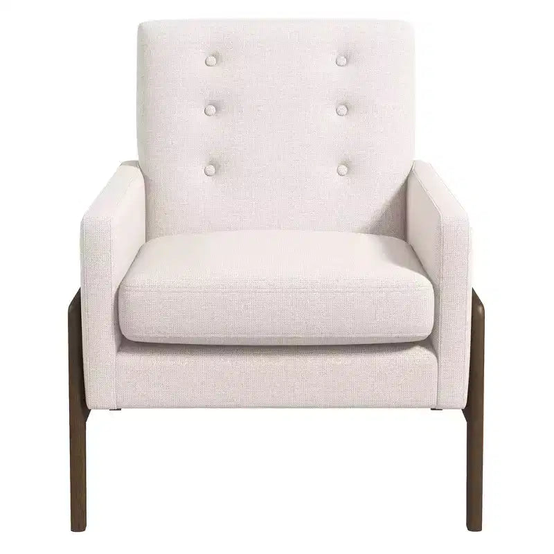 Fauteuil moderne en velours avec dossier capitonné et pieds en bois massif