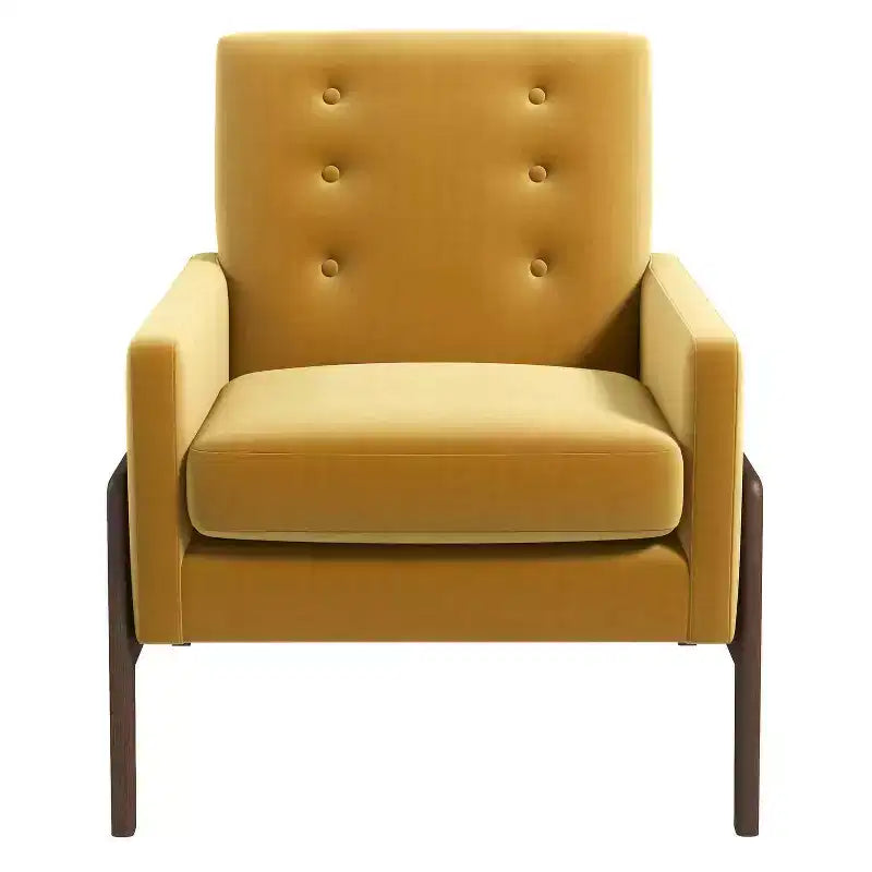 Fauteuil moderne en velours avec dossier capitonné et pieds en bois massif