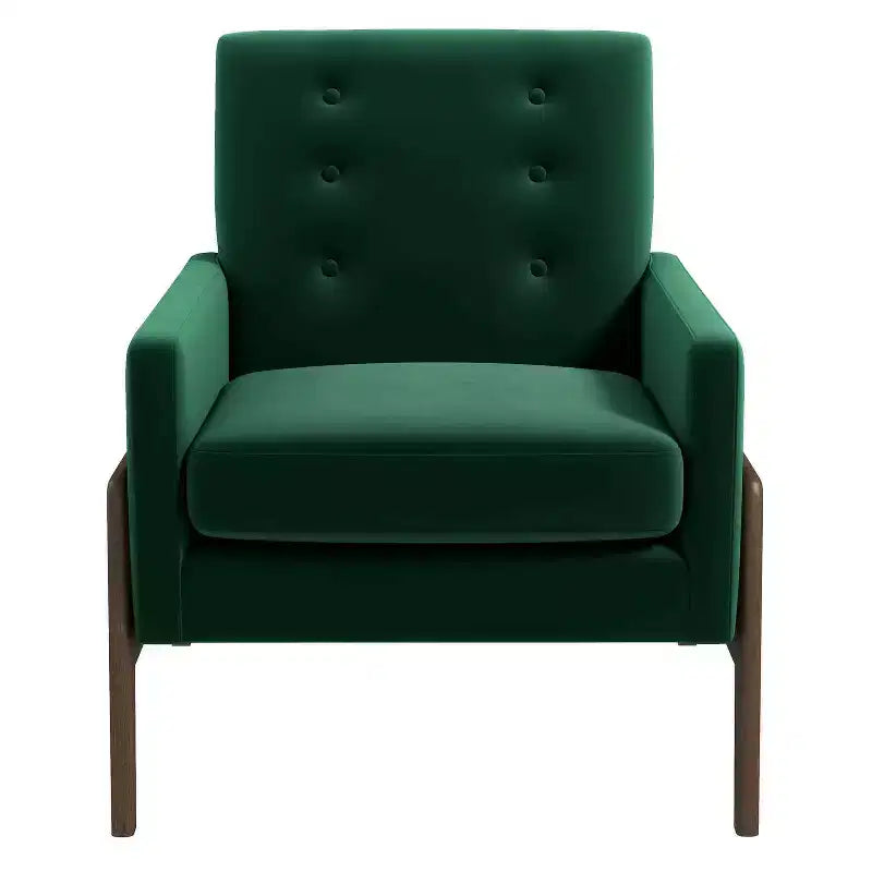 Fauteuil moderne en velours avec dossier capitonné et pieds en bois massif