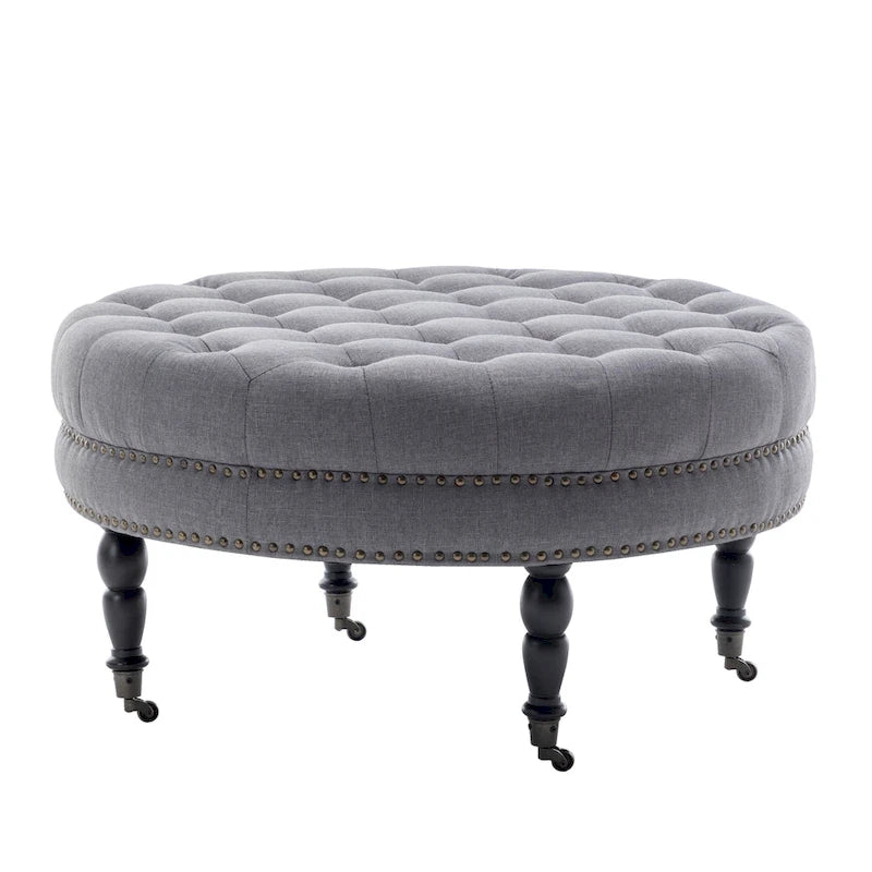Porthos Home Indy Fabric Round Cocktail Ottoman with Rubberwood Legs and Wheels